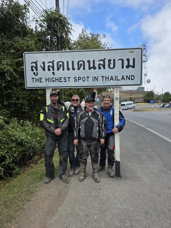 Riders at the highest point marker in Thailand